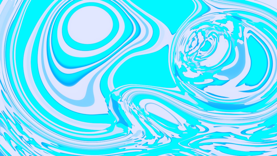 Abstract blue and white swirling liquid art.