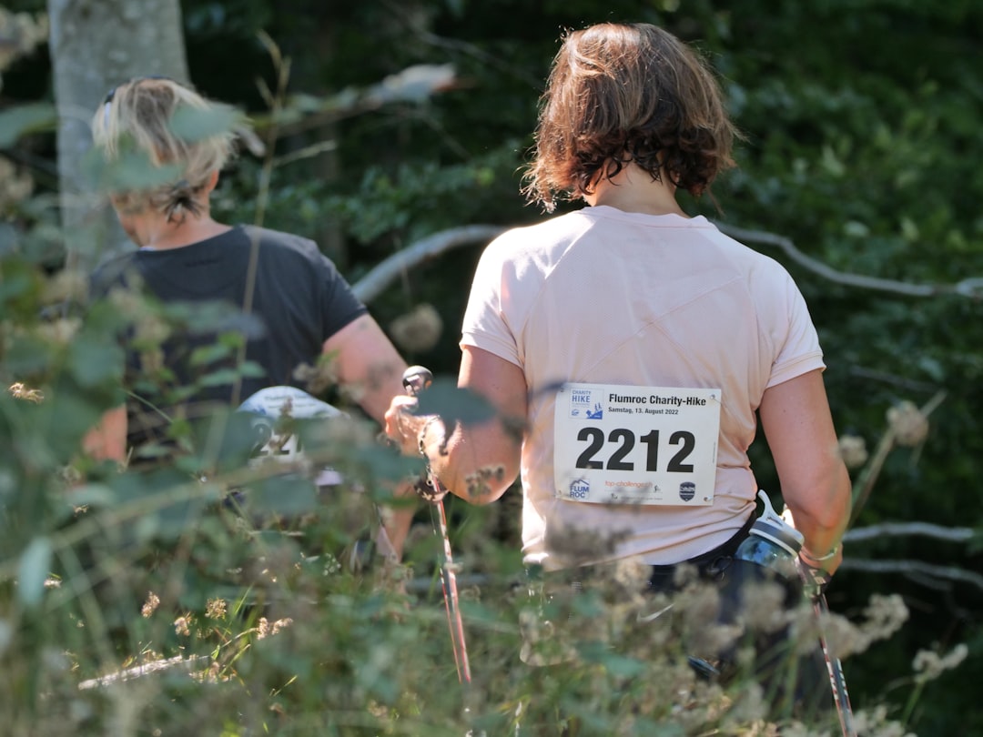 a couple of women in a forest